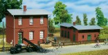 Railroad administrative building with shed